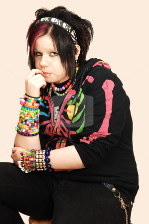 To use this stock image in your creative project, please select the size you need over to the right and click the "Add to Cart" button.
Your downloaded image will come with the Cutcaster watermark removed so don’t worry about the watermark you see on this page. Young punk girl stock photo, An single hipster punky girl in black looking wild in the camera. by Horst Petzold
