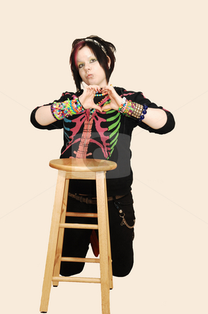 To use this stock image in your creative project, please select the size you need over to the right and click the "Add to Cart" button.
Your downloaded image will come with the Cutcaster watermark removed so don’t worry about the watermark you see on this page. Young punk girl stock photo, An single hipster punky girl in black looking wild in the camera. by Horst Petzold