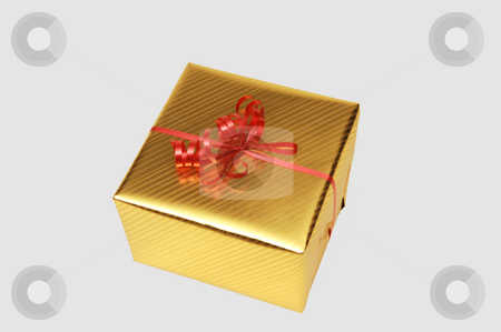 To use this stock image in your creative project, please select the size you need over to the right and click the "Add to Cart" button.
Your downloaded image will come with the Cutcaster watermark removed so don’t worry about the watermark you see on this page. Gift box. stock photo, An in gold wrapping paper wrapped gift with a red bow on top. by Horst Petzold