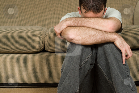 To use this stock image in your creative project, please select the size you need over to the right and click the "Add to Cart" button.
Your downloaded image will come with the Cutcaster watermark removed so don’t worry about the watermark you see on this page. Depression stock photo, A young man sitting on the floor suffering from clinical depression by Richard Nelson