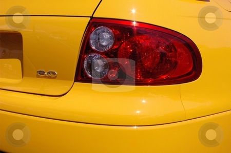 To use this stock image in your creative project, please select the size you need over to the right and click the "Add to Cart" button.
Your downloaded image will come with the Cutcaster watermark removed so don’t worry about the watermark you see on this page. 2006 GTO Rear Tail Light stock photo, This is the rebirth of an American Classic. by Joe Shortridge