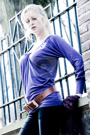 To use this stock image in your creative project, please select the size you need over to the right and click the "Add to Cart" button.
Your downloaded image will come with the Cutcaster watermark removed so don’t worry about the watermark you see on this page. Me the wall and attitude stock photo, Young blond girl outside on a street posing against the wall by Frenk and Danielle Kaufmann