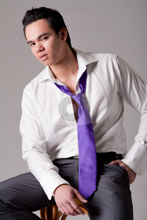 To use this stock image in your creative project, please select the size you need over to the right and click the "Add to Cart" button.
Your downloaded image will come with the Cutcaster watermark removed so don’t worry about the watermark you see on this page. Portrait of a strong young indonesian man in a suit looking temp stock photo, Business portrait of a strong indonesian man by Frenk and Danielle Kaufmann