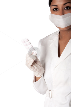 To use this stock image in your creative project, please select the size you need over to the right and click the "Add to Cart" button.
Your downloaded image will come with the Cutcaster watermark removed so don’t worry about the watermark you see on this page. Portrait of a beautifull Indonesian nurse with pills stock photo, Beautifull Indonesian nurse in white uniform by Frenk and Danielle Kaufmann
