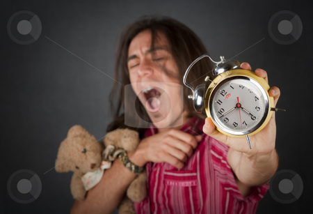 To use this stock image in your creative project, please select the size you need over to the right and click the "Add to Cart" button.
Your downloaded image will come with the Cutcaster watermark removed so don’t worry about the watermark you see on this page. Sleepy Young Man stock photo, Sleepy handsome young man with long hair and alarm clock by Scott Griessel