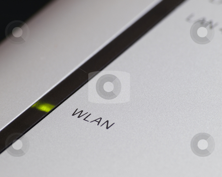 To use this stock image in your creative project, please select the size you need over to the right and click the "Add to Cart" button.
Your downloaded image will come with the Cutcaster watermark removed so don’t worry about the watermark you see on this page. Wirelessly connected stock photo, Close-up of router with focus on green light and WLAN text , shallow DOF by Vladimir Koletic