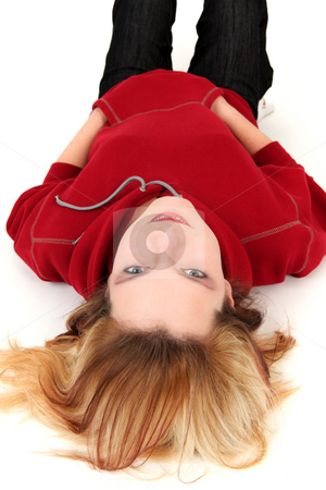 To use this stock image in your creative project, please select the size you need over to the right and click the "Add to Cart" button.
Your downloaded image will come with the Cutcaster watermark removed so don’t worry about the watermark you see on this page. Teenager stock photo, Young girl is lying on white background by Tom P.