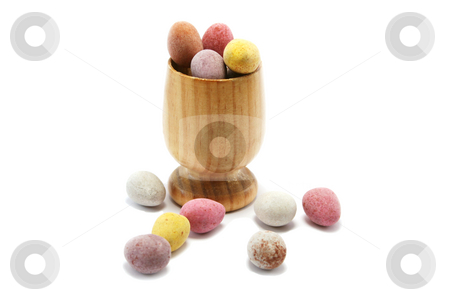To use this stock image in your creative project, please select the size you need over to the right and click the "Add to Cart" button.
Your downloaded image will come with the Cutcaster watermark removed so don’t worry about the watermark you see on this page. Easter Eggcup stock photo, Small wooden eggcup with candy coated chocolate easter eggs by Helen Shorey