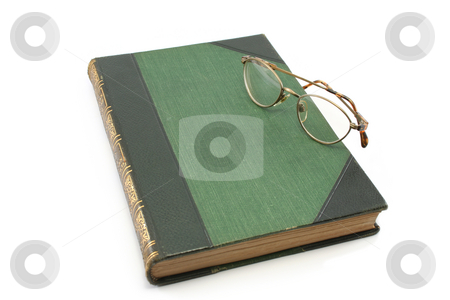 To use this stock image in your creative project, please select the size you need over to the right and click the "Add to Cart" button.
Your downloaded image will come with the Cutcaster watermark removed so don’t worry about the watermark you see on this page. Antiqu Book with Glasses stock photo, Old book (circa 1910) with pair of glasses by Helen Shorey