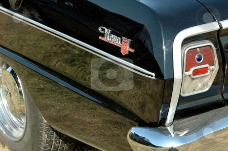 To use this stock image in your creative project, please select the size you need over to the right and click the "Add to Cart" button.
Your downloaded image will come with the Cutcaster watermark removed so don’t worry about the watermark you see on this page. 64 Nova Rear Corner Black stock photo, A great shot of a Nova rear corner. If you look close you can see that the paint has metal flake in it. by Joe Shortridge