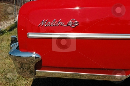 To use this stock image in your creative project, please select the size you need over to the right and click the "Add to Cart" button.
Your downloaded image will come with the Cutcaster watermark removed so don’t worry about the watermark you see on this page. 64 Chevelle rear Quarter Red stock photo, Classic Lines of an American beauty. by Joe Shortridge