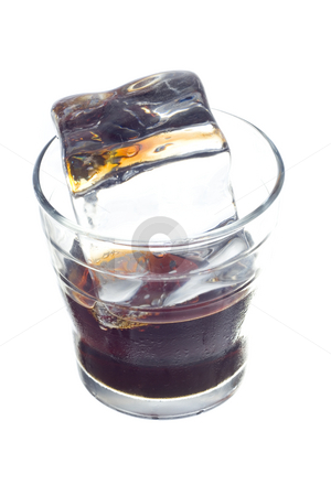 To use this stock image in your creative project, please select the size you need over to the right and click the "Add to Cart" button.
Your downloaded image will come with the Cutcaster watermark removed so don’t worry about the watermark you see on this page. Cold coke drink stock photo, Cola soft drink in a glass full of ice cubes by Ivan Montero