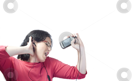 To use this stock image in your creative project, please select the size you need over to the right and click the "Add to Cart" button.
Your downloaded image will come with the Cutcaster watermark removed so don’t worry about the watermark you see on this page. Woman technology mp3 music stock photo, Young woman listening, dancing and singing to music in a mp3 device by Ivan Montero