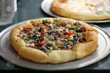 To use this stock image in your creative project, please select the size you need over to the right and click the "Add to Cart" button.
Your downloaded image will come with the Cutcaster watermark removed so don’t worry about the watermark you see on this page. Meat and Vegetable Pizza and Cheese Pizza stock photo, Meat and Vegetable Pizza and Cheese Pizza by Kim Stanley