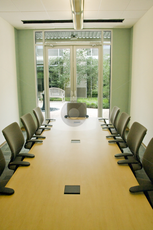 To use this stock image in your creative project, please select the size you need over to the right and click the "Add to Cart" button.
Your downloaded image will come with the Cutcaster watermark removed so don’t worry about the watermark you see on this page. Conference Room stock photo, A small modern conference room for office meeting by Kevin Tietz