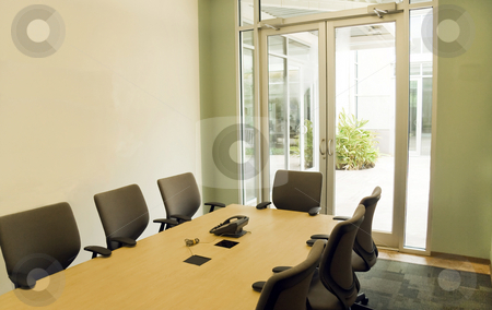 To use this stock image in your creative project, please select the size you need over to the right and click the "Add to Cart" button.
Your downloaded image will come with the Cutcaster watermark removed so don’t worry about the watermark you see on this page. Conference Room stock photo, A small modern conference room for office meeting by Kevin Tietz
