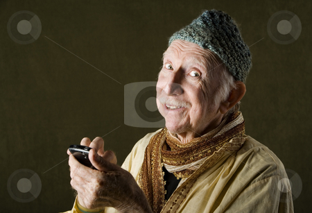 To use this stock image in your creative project, please select the size you need over to the right and click the "Add to Cart" button.
Your downloaded image will come with the Cutcaster watermark removed so don’t worry about the watermark you see on this page. Cell Phone Guru stock photo, Wise Man with Knit Cap Talking on Cell Phone by Scott Griessel