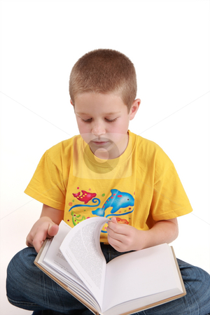 To use this stock image in your creative project, please select the size you need over to the right and click the "Add to Cart" button.
Your downloaded image will come with the Cutcaster watermark removed so don’t worry about the watermark you see on this page. Sitting boy stock photo, Young boy is reading the book - on white background by Tom P.