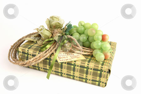 To use this stock image in your creative project, please select the size you need over to the right and click the "Add to Cart" button.
Your downloaded image will come with the Cutcaster watermark removed so don’t worry about the watermark you see on this page. Christmas present stock photo, Christmas present in green paper with unusual decorations by Tom P.