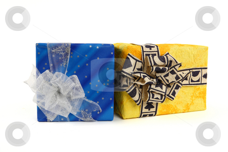 To use this stock image in your creative project, please select the size you need over to the right and click the "Add to Cart" button.
Your downloaded image will come with the Cutcaster watermark removed so don’t worry about the watermark you see on this page. Christmas presents stock photo, Two christmas presents with ties on white background by Tom P.