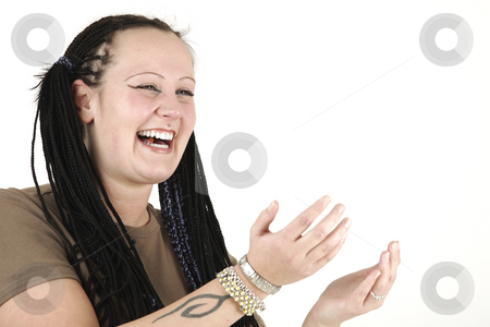 To use this stock image in your creative project, please select the size you need over to the right and click the "Add to Cart" button.
Your downloaded image will come with the Cutcaster watermark removed so don’t worry about the watermark you see on this page. Young woman stock photo, Young woman is laughing by Tom P.