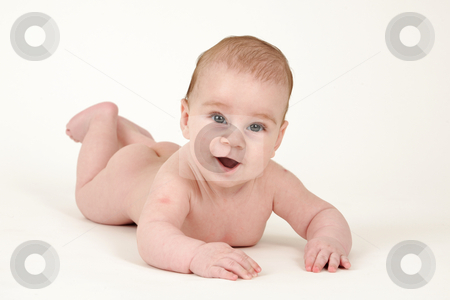 To use this stock image in your creative project, please select the size you need over to the right and click the "Add to Cart" button.
Your downloaded image will come with the Cutcaster watermark removed so don’t worry about the watermark you see on this page. Small kid lying stock photo, Small kid lying on white background by Tom P.