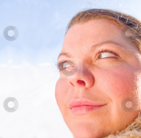 To use this stock image in your creative project, please select the size you need over to the right and click the "Add to Cart" button.
Your downloaded image will come with the Cutcaster watermark removed so don’t worry about the watermark you see on this page. Young woman looking at blue copyspace stock photo, Young woman looking at blue copy space by Phillip Dyhr Hobbs