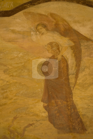 To use this stock image in your creative project, please select the size you need over to the right and click the "Add to Cart" button.
Your downloaded image will come with the Cutcaster watermark removed so don’t worry about the watermark you see on this page. Icon paintings in monastery interior stock photo, Iconography painted icons with saints on monastery wall by Desislava Dimitrova