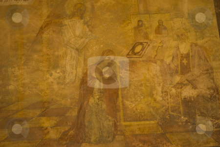 To use this stock image in your creative project, please select the size you need over to the right and click the "Add to Cart" button.
Your downloaded image will come with the Cutcaster watermark removed so don’t worry about the watermark you see on this page. Icon paintings in monastery interior stock photo, Iconography painted icons with saints on monastery wall by Desislava Dimitrova