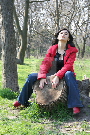 To use this stock image in your creative project, please select the size you need over to the right and click the "Add to Cart" button.
Your downloaded image will come with the Cutcaster watermark removed so don’t worry about the watermark you see on this page. Hemp in wood stock photo, The nice girl sits on hemp in wood by Aleksandr GAvrilov