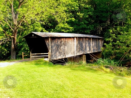 To use this stock image in your creative project, please select the size you need over to the right and click the "Add to Cart" button.
Your downloaded image will come with the Cutcaster watermark removed so don’t worry about the watermark you see on this page. Closed wooden bridge stock photo, A closed antique wooden bridge over a river in the mountains of Virginia. by Horst Petzold