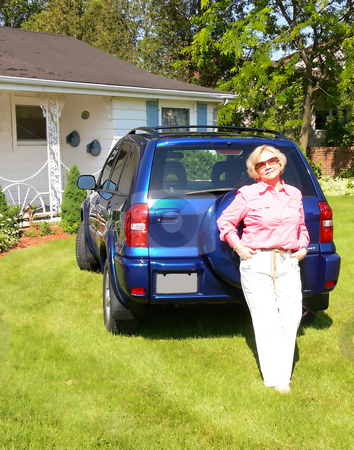 To use this stock image in your creative project, please select the size you need over to the right and click the "Add to Cart" button.
Your downloaded image will come with the Cutcaster watermark removed so don’t worry about the watermark you see on this page. Lady with blue car stock photo, An senior citizen with her new blue SUV on the front lawn of her house. by Horst Petzold