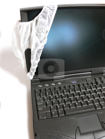 To use this stock image in your creative project, please select the size you need over to the right and click the "Add to Cart" button.
Your downloaded image will come with the Cutcaster watermark removed so don’t worry about the watermark you see on this page. Laptop with pantie stock photo, A laptop on white background is decorated with a white pantie. by Horst Petzold
