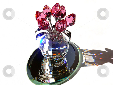 To use this stock image in your creative project, please select the size you need over to the right and click the "Add to Cart" button.
Your downloaded image will come with the Cutcaster watermark removed so don’t worry about the watermark you see on this page. Crystal flower stock photo, An beautiful crystal ball with red tulips on, in sunshine with the colorful
sparkle all around. by Horst Petzold