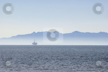 To use this stock image in your creative project, please select the size you need over to the right and click the "Add to Cart" button.
Your downloaded image will come with the Cutcaster watermark removed so don’t worry about the watermark you see on this page. Offshore oilrig stock photo, An off-shore oil platform on the pacific coast, off California by Stephen Gibson