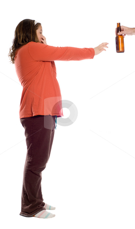 To use this stock image in your creative project, please select the size you need over to the right and click the "Add to Cart" button.
Your downloaded image will come with the Cutcaster watermark removed so don’t worry about the watermark you see on this page. No Beer For Me stock photo, A young girl holding her nose and waving away an offering of a bottle of beer, isolated against a white background by Richard Nelson
