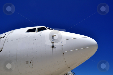 To use this stock image in your creative project, please select the size you need over to the right and click the "Add to Cart" button.
Your downloaded image will come with the Cutcaster watermark removed so don’t worry about the watermark you see on this page. Airplane nose stock photo, Cockpit of a jet airliner by Fernando Barozza