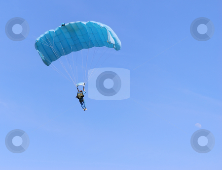 To use this stock image in your creative project, please select the size you need over to the right and click the "Add to Cart" button.
Your downloaded image will come with the Cutcaster watermark removed so don’t worry about the watermark you see on this page. Blue parachute stock photo, A blue parachute on a bright sunny day. by Ivan Paunovic