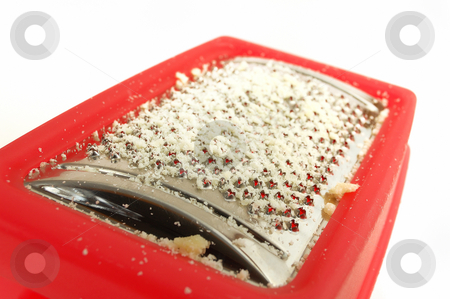 To use this stock image in your creative project, please select the size you need over to the right and click the "Add to Cart" button.
Your downloaded image will come with the Cutcaster watermark removed so don’t worry about the watermark you see on this page. Parmesan grater stock photo, A closeup of red plastic parmesan grater by ALESSANDRO TERMIGNONE