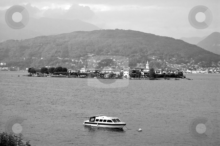 To use this stock image in your creative project, please select the size you need over to the right and click the "Add to Cart" button.
Your downloaded image will come with the Cutcaster watermark removed so don’t worry about the watermark you see on this page. Lago Maggiore Isola Pescatori stock photo, An old style black and white picture of the Isola dei Pescatori, Lago Maggiore, Italy by Roberto Marinello