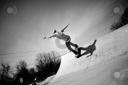 To use this stock image in your creative project, please select the size you need over to the right and click the "Add to Cart" button.
Your downloaded image will come with the Cutcaster watermark removed so don’t worry about the watermark you see on this page. Skateboard Ramp stock photo, Portrait of a young skateboarder skating on a ramp at the skate park. by Todd Arena