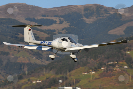 To use this stock image in your creative project, please select the size you need over to the right and click the "Add to Cart" button.
Your downloaded image will come with the Cutcaster watermark removed so don’t worry about the watermark you see on this page. Katana on final for Zell stock photo, A Katana on final approach to Zell am See (LOWZ) airfield by Alexander Gerzabek