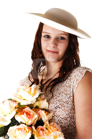 To use this stock image in your creative project, please select the size you need over to the right and click the "Add to Cart" button.
Your downloaded image will come with the Cutcaster watermark removed so don’t worry about the watermark you see on this page. Woman with hat and roses. stock photo, Beautiful lady in a beige long dress and hat standing in the studio with
yellow roses in her arm smiling, for white background. by Horst Petzold