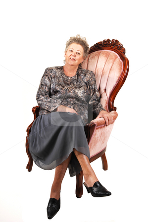 To use this stock image in your creative project, please select the size you need over to the right and click the "Add to Cart" button.
Your downloaded image will come with the Cutcaster watermark removed so don’t worry about the watermark you see on this page. Senior woman in pink armchair. stock photo, All dressed up elderly woman sitting in an pink armchair, enjoying her life,
for white background.. by Horst Petzold