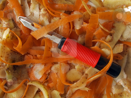 To use this stock image in your creative project, please select the size you need over to the right and click the "Add to Cart" button.
Your downloaded image will come with the Cutcaster watermark removed so don’t worry about the watermark you see on this page. Vegetable scraper and peelings. stock photo, Vegetable scraper with carrot and potato peelings . by Ian Langley