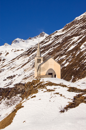 To use this stock image in your creative project, please select the size you need over to the right and click the "Add to Cart" button.
Your downloaded image will come with the Cutcaster watermark removed so don’t worry about the watermark you see on this page. Church in winter alpine landscape stock photo, A small church in a winter landscape, Val Formazza, Alps, Italy by Roberto Marinello