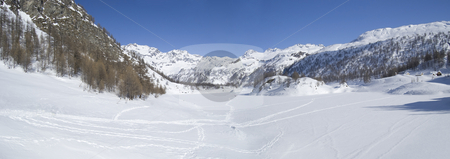 To use this stock image in your creative project, please select the size you need over to the right and click the "Add to Cart" button.
Your downloaded image will come with the Cutcaster watermark removed so don’t worry about the watermark you see on this page. Icy winter alpine lake stock photo, Icy alpine lake landscape full of snow; Alps, Italy by Roberto Marinello