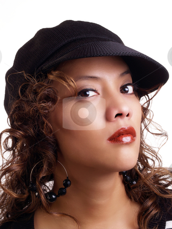 To use this stock image in your creative project, please select the size you need over to the right and click the "Add to Cart" button.
Your downloaded image will come with the Cutcaster watermark removed so don’t worry about the watermark you see on this page. Pretty young hispanic woman wearing black hat stock photo, Portrait of pretty latina woman in black hat by Jeff Cleveland