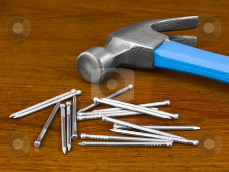 To use this stock image in your creative project, please select the size you need over to the right and click the "Add to Cart" button.
Your downloaded image will come with the Cutcaster watermark removed so don’t worry about the watermark you see on this page. Hammer and Nails stock photo, Hammer and Nails on a wooden background by John Teeter