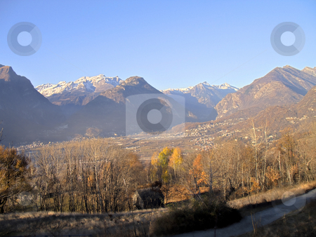 To use this stock image in your creative project, please select the size you need over to the right and click the "Add to Cart" button.
Your downloaded image will come with the Cutcaster watermark removed so don’t worry about the watermark you see on this page. Mountain valley hdr panorama stock photo, A panorama of Ossola Valley. Mountains in fall season with the first snow, Italy, HDR by Roberto Marinello